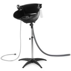 a black chair with a hose attached to it