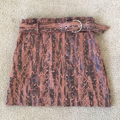 Sexy Haute Monde Brown And Black Animal Print Skirt Size Large. This Item Is Not Nwt, However It’s Only Been Worn A Few Times. It Comes With A Cute Adjustable Belt And Pockets. It Is 15.5” Wide And 17.5” Long. Please Feel Free To To Message Me With Any Questions And Happy Poshing Brown Bottoms For Club Wear, Casual Brown Skirt For Party, High Waist Brown Skirt For Party, High Waist Brown Skirt For Night Out, Trendy Brown Lined Skirt, Casual Brown Party Skirt, High Waist Brown Party Skirt, Brown High Waist Mini Skirt For Party, Brown High Waist Party Skirt