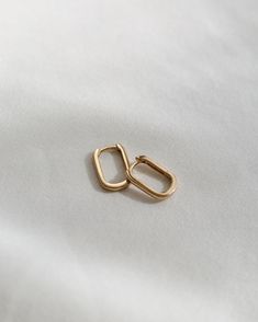 Reshape your stack with this sleek stretch on a classic silhouette (featuring our comfiest clasp yet)! Seriously sublime in a second or third piercing. Sold as a pair. Third Piercing, Digital Gift Card, Digital Gifts, Classic Silhouette, Recycled Gold, Recycled Sterling Silver, Gold And Silver, Real Gold, Letterpress