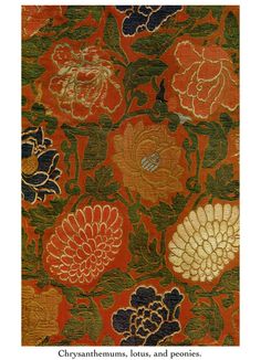 an orange and green floral pattern on fabric