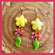 Ceramic Flower Beads, Glass Beads French Hook Styled Plated Brass Findings, Nickel Free Handcrafted In My Brooklyn Studio Yellow Dangle Beaded Earrings For Gifts, Yellow Whimsical Dangle Earrings, Whimsical Yellow Dangle Earrings, Yellow Flower Earrings With Colorful Beads For Gift, Whimsical Yellow Jewelry With Ear Wire, Yellow Flower Earrings With Colorful Beads, Yellow Flower-shaped Jewelry With Flower Decoration, Elegant Yellow Flower-shaped Jewelry With Flower Decoration, Handmade Yellow Beaded Earrings With Czech Glass