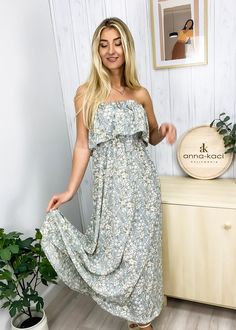 The EMES SHOP dress is detailed with a gorgeous floral print. Features a tube neck line. layered design. flowy fit. and ankle length maxi dress. Pair it with sunnies and a straw hat for a stunning summer look.MATERIAL:100%Soft Poly MEASUREMENTS:Dress Length is 47"-48"in Small | Bust: 35"-37"in & Waist: 26"-28"in Medium | Bust: 37"-39"in & Waist: 28"-30"in Large | Bust: 39"-41"in & Waist: 30"-32"in MEASUREMENTS:Dress Length is120-122 cm Small | Bust: 88"-93"cm& Waist:66"-71"cm Medium | Bust: 93"-98"cm & Waist:71"-76"cm Large | Bust: 98"-103"cm & Waist:76"-81"cm Strapless Summer Maxi Dress With Floral Print, Strapless Floral Print Summer Maxi Dress, Spring Strapless Maxi Dress With Floral Print, Strapless Floral Maxi Dress For Beach Season, Strapless Summer Maxi Dress, Strapless Maxi Dress For Spring And Summer, Flowy Strapless Sundress For Spring, Strapless Flowy Sundress For Spring, Strapless Maxi Dress For Summer Brunch