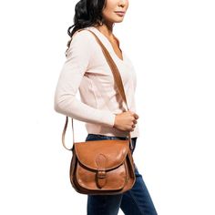 The brown leather crossbody purse brings timeless style to any wardrobe. Beautifully designed and handcrafted in rich, burnished leather, this signature crossbody purse comes equipped with a divided interior and an extra exterior pocket, so you can stay organized all day long. Pair this classic crossbody purse with closed toe sandals and an open mind or gladiator sandals for women and wild adventures. Whether it's on your daily commute or a weekend away from it all, this handcrafted leather bag Classic Crossbody Saddle Bag For On-the-go, Timeless Shoulder Bag For Travel In Fall, Timeless Brown Flap Bag For Everyday Use, Timeless Saddle Shoulder Bag For Everyday, Timeless Shoulder Saddle Bag For Everyday Use, Classic Brown Saddle Bag With Adjustable Strap, Classic Soft Leather Saddle Bag For On-the-go, Timeless Brown Satchel With Adjustable Strap, Brown Saddle Bag With Adjustable Strap For Fall