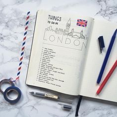 an open notebook with things to do in london