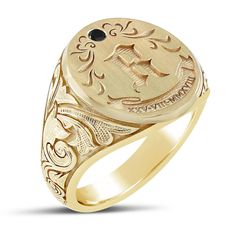 This exquisite men's 14k solid yellow gold monogram ring features extensive Celtic engraved design and a black round cut bezel set diamond. Customized with your initial per request. 
   This is a custom made to order item and can be modified to fit your needs. Please contact us for modifications or special sizing options.      ADDITIONAL INFORMATION : 
Width: 8mm 
Metal: 14K Yellow Gold 
 Finish: Brush 
Style #: M181 Formal 14k Gold Signet Ring With Initials, 14k Gold Signet Ring With Initials For Formal Occasions, Formal Round Monogram Jewelry, Formal Monogram Round Jewelry, Luxury Oval Signet Ring With Monogram, Formal 14k Gold Monogram Rings, Formal 14k Gold Rings With Monogram, Luxury Round Signet Ring With Initials, Luxury 14k Gold Monogram Rings