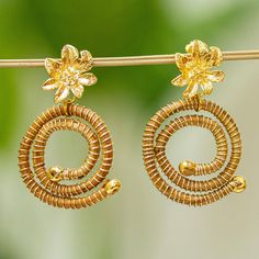 These beautiful dangle earrings are designed by Mexico's Laura Villalvazo who crafts them with pine needles gathered from the forest floors in the state of Jalisco. The pine needle spirals are accented with 14k gold plated copper and swing from brilliant gold plated flowers. Forest Flowers, Pine Needles, Floral Earrings, Post Earrings, Jewelry Earrings Dangle, Dangle Earrings, Gold Plate, Jewelry Earrings, Plating