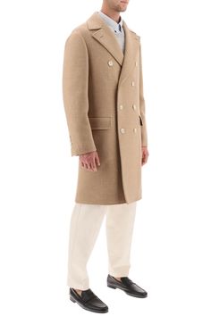 Brunello Cucinelli coat crafted in wool and cashmere. Double-breasted design with eight-button closure featuring peak lapel, front jetted pockets with flap, four-button cuffs and back center vent. Partially lined interior with two pockets and a pen holder. Regular fit with deconstructed shoulders. The model is 187 cm tall and wears size IT 48. Size Info IT Color Detail Beige Made In Italy Material 95% WO 5% WS Season One fall Season Two winter Product clothing Brand Brunello Cucinelli Size And F Peak Lapel, Cape Coat, Double Breasted Coat, Cool Socks, Pant Shirt, Pen Holder, Brunello Cucinelli, Jeans Dress, Winter Wardrobe