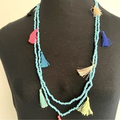 Bright, Fun And Boho Is The Best Way To Describe This Multi-Color Beaded Tassels Necklace. Fluffy Colorful Tassels It's A Tassel Necklace With All The Colors Of The Rainbow And More 17” Drop Over The Head Closure Very Fun To Wear It. One Sz Fits All. Summer Light Blue Beaded Necklaces For Beach, Light Blue Beaded Necklace For Summer Beach, Summer Beach Light Blue Beaded Necklaces, Light Blue Beaded Necklaces For The Beach, Adjustable Tassel Necklace For Beach, Blue Beaded Fringe Jewelry For Beach, Light Blue Beaded Necklace For The Beach, Light Blue Beaded Necklace For Beach, Adjustable Multicolor Beaded Tassel Necklace