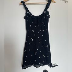 Reformation Mini Dress, Size 4, Black With Moon And Stars Pattern. Stretchy Bodice To Allow For Movement. Incredibly Flattering! Sleeveless Star Print Dress For Night Out, Casual Black Dresses For Night, Casual Black Night Dress, Black Summer Night Dress, Black Fitted Star Print Dress, Black Mini Dress With Star Print, Fitted Black Dress With Star Print, Fitted Black Star Print Dress, Spring Black Dress With Star Print