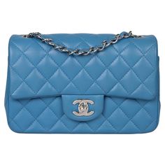 Chanel Blue Quilted Lambskin Rectangular Mini Flap Bag Product Details Xupes Ref: HB5683 Brand: Chanel Model: Rectangular Mini Flap Bag Type: Shoulder, Crossbody Serial Number: 27904097 Age: 2019 Accompanied By: Chanel Dust Bag, Box, Authenticity Card Colour: Blue Hardware: Silver Material(s): Lambskin Leather Specification Height: 12cm Width: 20cm Depth: 7cm Strap Drop: 56cm Interior: Blue Leather Closure: Turn Lock Country of Origin: France Authenticity Details: Serial Sticker, Authenticity Card Condition Condition Rating: Excellent Exterior Condition: The exterior is in excellent condition with minimal signs of use. Interior Condition: The interior is in excellent condition with minimal signs of use. Hardware Condition: The hardware is in excellent condition with gentle signs of use. Co Classic Blue Rectangular Shoulder Bag, Blue Flap Bag With Adjustable Strap For Formal Occasions, Blue Square Bag For Formal Occasions, Blue Square Bags For Formal Occasions, Classic Blue Bag With Adjustable Strap, Blue Flap Bag With Removable Pouch For Formal Occasions, Classic Blue Rectangular Bag, Blue Rectangular Flap Bag For Formal Occasions, Formal Blue Flap Bag With Removable Pouch