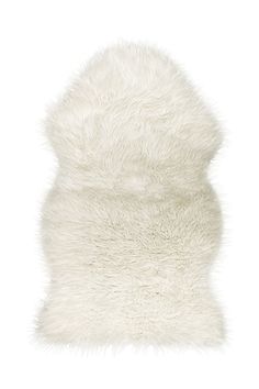 a white fur pillow on a white background