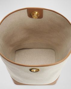 Altuzarra bucket bag in leather and canvas cotton    Shoulder strap, 15" drop    Open top with pushlock closure     Approx. 14"H x 8.3"W x 9"D    Made in Spain Canvas Bucket Bag, Leather And Canvas, North South, Open Top, Top Designers, Bucket Bag, Neiman Marcus, Tops Designs, Shoulder Strap