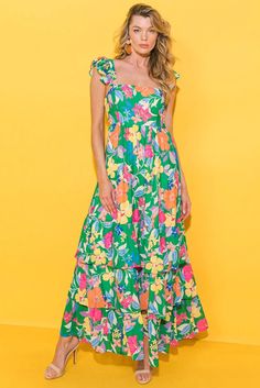 Channeling summer vibes, this airy dress is ideal for sunny days and beach adventures. The flowy fit is complemented by a playful ruffled shoulder strap, adding an extra touch of movement and visual appeal. The vivid floral print adds a pop of color and a fun, fresh feeling. With its high waist design, this dress flatters curves and creates a feminine silhouette. 100%Polyester Size Chart (INCH) Sizes Bust Waist Hem_Width Length Shoulder_Girdle Relax Relax Relax Relax Relax S 31.5 25.6 105.3 53.9 Shoulder Girdle, Airy Dress, Layered Sweater, Beach Adventure, Fresh Feeling, Boho Green, Feminine Silhouette, Tiered Maxi Dress, Summer Floral