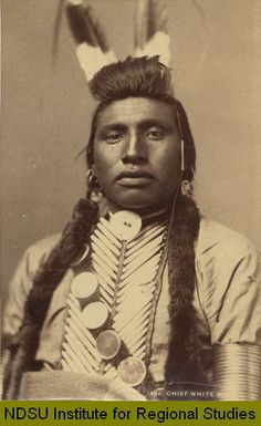 an old photo of a native american man