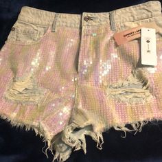 Bnwt Sunset + Spring Distressed Light Washed Denim Shorts With Iridescent Sequins Size 27 Sunset Spring, Billabong Shorts, Festival Shorts, Spring Shorts, High Waisted Jean Shorts, High Rise Denim Shorts, Denim Cutoff Shorts, Cut Off Jeans, Jeans For Short Women