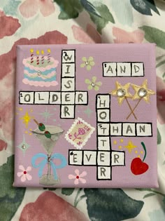 a close up of a crossword puzzle on a blanket