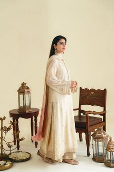 Traditional Chinon Lawn Suit With Resham Embroidery, Festive Raw Silk Lawn Suit With Traditional Drape, Unstitched Raw Silk Traditional Wear For Eid, Designer Raw Silk Lawn Suit With Resham Embroidery, Designer Raw Silk Lawn Suit For Eid, Festive Lawn Suit With Dabka On Raw Silk, Festive Raw Silk Lawn Suit With Dabka, Festive Raw Silk Lawn Suit With Zari Work, Festive Designer Raw Silk Lawn Suit