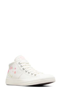 Embroidered flowers give a charming finish to a mid-top canvas sneaker with a signature lace-to-toe design. Textile upper and lining/rubber sole Imported Lace-up Canvas Shoes With Embroidered Logo And White Sole, Converse Low-top Canvas Shoes With Embroidered Logo, Lace-up Canvas Shoes With Embroidered Logo, Casual Mid-top Sneakers With Embroidered Logo, Low-top Cotton Canvas Shoes With Embroidered Logo, Casual Canvas Sneakers With Embroidered Logo, High-top Cotton Sneakers With Floral Embroidery, Casual High-top Lace-up Sneakers With Embroidered Logo, Cotton Lace-up Sneakers With Embroidered Logo