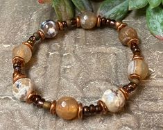 "Very cool and unique copper stretch bracelet with brown agate and copper beads. Fits an average woman's wrist of 6 - 6.5\" but can be made smaller or larger if needed." Brown Beaded Bracelets, Bracelet Inspo, Brown Agate, Brown Bracelet, Women's Bracelets, Creative Stuff, Boho Bracelet, Beaded Stretch Bracelet, Prayer Beads