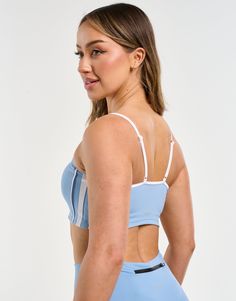 The Freedom Sportsbra combines everything you need in the support of a sports bra into a crop top design. The Freedom Sportsbra is incredibly soft, breathable and perfected in both fit and design - Double lined with no padding - Support is light to moderate - Supportive straps with a crossback design - Fabric is incredibly soft and breathable 80% Polyester, 20% Spandex Bella is wearing a Small, is 5'4" Sports Crop Top With Built-in Bra And High Stretch, Supportive Sports Bra With Built-in Bra For Light Sports, Yoga Crop Top Sports Bra With Built-in Bra, Functional Crop Top With Built-in Bra For Workout, Medium Support Sports Bra With Built-in Bra, Cropped Yoga Sports Bra With Built-in Bra, Functional Workout Crop Top With Built-in Bra, Cropped Sports Bra With Built-in Bra For Training, Casual Sports Crop Top With Built-in Bra