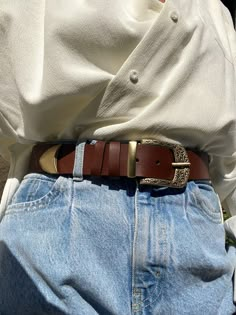 A Handmade Brown Leather Belt for women, that is made from Real Genuine Leather with a unique Gold buckle at the center and two more buckles that i use for decoration. The buckle at the edge of the belt is really special as well. Choose the ideal length for you between 6 different dimensions. (THE DIMENSIONS ARE FOR BELT NOT FOR YOUR WAIST) MATERIALS - Real Genuine Leather. - Metal Buckles are made from Zamak. DIMENSIONS - Belt's Width 4 Cm (1.5'') - You can choose between Six different Lengths.