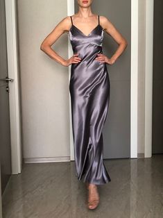 This silk satin slip dress can be worn as a bridesmaid dress, party and date dress and for many other occasions. Made of satin silk. DESCRİPTİON:  -Adjustable straps.  -Designed for a slim but relaxed fit.  -Unlined. İt is a custom made dress, tailored according to your preferences, you can choose the length of the dress and order it with cut on the front.  While ordering write your bust, waist and hips measure, so the dress will be made to your size. Please enquire if you're interested in different color. SIZING INFO: XS/34/US4: bust: 82-86cm (32-33 inch) waist 64-66 cm (24-25 inch)  S/36/ US6: bust: 86-88cm (33-34 inch) waist: 66-68 cm (25-26 inch) M/38/ US8: bust: 88-92 cm (34-36 inch) waist: 68-72 cm (26-28 inch) L/40/ US10:  bust: 92-94 cm (36-37 inch) waist: 72-74 cm (28-29 inch) WAS Dark Grey Satin Dress, Elegant Satin Dress With Adjustable Straps, Fitted Satin Wedding Dress With Spaghetti Straps, Elegant Party Slip Dress With Adjustable Straps, Satin Suspender Dress With Spaghetti Straps For Prom, Silk Slip Dress With Adjustable Straps For Party, Fitted Slip Dress With Spaghetti Straps For Wedding Night, Elegant Fitted Satin Suspender Dress, Fitted Satin Slip Dress For Wedding Night