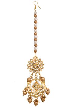 Add this mang tika s to your jewellery collection and shine at the next ethnic event. Embellished with beads, it is truly a stunning piece to flaunt this season. Product Features: Color: Gold Tone Kundan Handcrafted Maang Tikka Material: Metal copper alloy, Synthetic Pearls/beads work : kundan with meenkari on back side Dimension: Length-7in Width- 1.5 in Pack Of: mang tika Occasion: festive and wedding Disclaimer: There will be slight difference in digital to actual image Gold Kundan Tikka For Festive Occasions, Gold Kundan Tikka For Party, Formal Gold Tikka With Stone Work, Festive Gold Kundan Tikka, Kundan Mang Tika, Mang Tika, Beads Work, Maang Tikka, Buy Gold