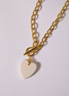 16" gold-filled link chain attached with dangling white bone heart. Logan Tay, Heart Images, Girl Gang, Jewelry Inspo, Accessories Jewelry, Link Chain, Heart Necklace, Gold Filled, Bones