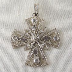 Sterling Silver Ornate Cross Spiritual Cross Jewelry With Intricate Design, Sterling Silver Cross Necklace With Intricate Design, Ornate Engraved Cross Pendant Jewelry, Ornate Sterling Silver Cross Jewelry, Ornate Silver Cross Jewelry, Silver Cross Jewelry With Intricate Design, Ornate Cross Necklace With Intricate Design, Ornate Handmade Cross Jewelry, Silver Filigree Cross Jewelry