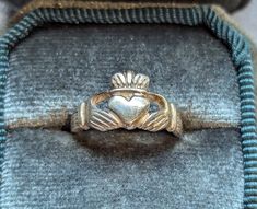 Vintage Sterling Silver Claddagh ring. Traditional Celtic design. Ring is fully hallmarked and will arrive gift boxed. * HALLMARKS 925. * SIZE 5, face of ring measures 3/8" wide. * CONDITION In very good to excellent condition. * MATERIALS Sterling Silver. Vintage Claddagh Ring, Claddagh Ring, Silver Claddagh Ring, Irish Ring Claddagh, Irish Rings, Vintage Silver Jewelry, Claddagh Rings, Irish Jewelry, Celtic Designs