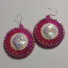 Hand-made beaded earrings: Colors: magenta w/rainbow Closure: Hook size: 2 inches Handmade Beaded Earrings, Handmade Earrings Beaded, Bead Work Jewelry, Work Jewelry, Gift Accessories, Hand Beading, Earring Gifts, Beading Patterns, Beaded Earrings