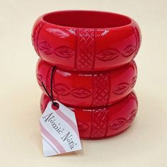 This beautiful deep red RESIN bangle is inspired by Vintage Bakelite carved bracelets  Perfect for your Vintage style!  Perfect for any occasion!!  Match it with the small, medium version bracelets and the carved earrings  INNER CIRCUMFERENCE 6.5 cm approx HEIGHT 3 cm approx Like any handmade product there may be small imperfections  For any needs please do not hesitate to contact me, I will be happy to answer!  Shipments may be subject to slight delays  I ship by Postal Service: Posta 1 in Italy and International Priority Mail abroad both untraceable  If you would like Trackable shipping please contact me in private Luxury Vintage Red Bangle, Resin Bangles, Vintage Bakelite, Bangles Style, 50s Vintage, Christmas Earrings, Postal Service, Deep Red, Beautiful Necklaces