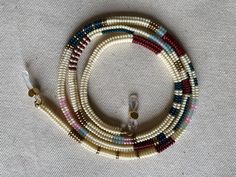 This handmade eyeglass holder necklace is delicately hand woven from pinned glass beads. The boho style eyeglass chain is a unique women's sunglasses chain in herringbone pattern. It is a light, multi-colored beaded eyeglass thread that you can use comfortably all day long. This 100% handmade beaded eyeglass accessory reflects your style. We have color and model options according to your style. You can use this chain on both your sunglasses and reading glasses. You can optionally use it as an airpods holder. They are also stylish products that you can gift to your loved ones. Length 75 cm 29.5 inch Your wishes are important to me, you can write me a message if you have the color and pattern you want. You can click on the link to see my other handmade products: https://www.etsy.com/shop/Bej Beaded Sunglasses Chain, Eyeglass Holder Necklace, Eyeglasses Holder Necklace, Beaded Sunglasses, Eyeglass Accessories, Glasses Strap, Sunglasses Chain, Glasses Chains, Style Glasses