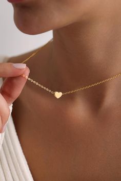 Welcome to the magical world of PKJewelry Love Pendant Necklace Minimalist Heart Necklace is perfect as a special gift for her. This Mini Love Necklace is a great choice as a gift for Mother's Day, Birthday, Anniversary, Valentine's Day, Christmas. High quality heart necklace is specially prepared for you with great care. The gold plating on it is much thicker than other platings. Therefore, it is a nice gift to be used for a long time. Our products do not tarnish and are anti-allergic. - Our chains are sent with 16 inch and 2 inch extension chain. You can adjust it to the size you want. If you want it shorter or longer, please contact us.   All Our Heart Locket Necklace  https://www.etsy.com/shop/PKJewelryNecklace?ref=shop-header-name&listing_id=1794870106&from_page=listing&search_query=h Valentine's Day Gift Heart Necklace With Delicate Chain, Heart Necklace For Birthday And Valentine's Day, Heart Shaped Charm Necklace As Gift, Heart Shaped Clavicle Chain Charm Necklace As Gift, Valentine's Day Heart Necklace With Delicate Chain, Minimalist Heart Charm Necklace As Gift, Minimalist Heart Charm Necklace Gift, Heart-shaped Charm Necklace For Valentine's Day, Minimalist Heart Necklace As A Gift