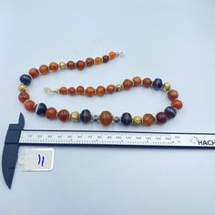 The Beautiful Old Carnelian and Banded Agate Rami Sulumani Prayer Beads From Himalaya Tibet It Was Used As Prayer Amulet Beads In Prayer Malas In Ancient Times And Even They Using Now Very Smooth Oily Skin Of This Agate Brown Carnelian Beaded Jewelry, Handmade Amber Agate Beads, Gems, And Cabochons, Traditional Orange Jewelry For Healing, Traditional Orange Healing Jewelry, Traditional Carnelian Beads As A Gift, Traditional Carnelian Beads For Gift, Carnelian Amulet Jewelry With Round Beads, Traditional Agate Beads For Jewelry Making, Traditional Agate Beads And Cabochons For Gifts