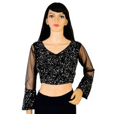 Item Description Beautiful Women's Velvet Sequins V-Neck Net Sleeves Ethnic Designer Blouse Fabric:-Velvet Sequins Color:-Black Sale For:-1 Blouse Closure Type:-Back Hook & Eye With Dori Sleeves Type:-3/4 Sleeves Neck Style:-V-Neck Product:-Padded Blouse With Cotton Inner Lining Care Instructions:-Hand Wash or Dry Clean Only Disclaimer:-The Actual Color Of The Product Slightly Vary From The Image Due To Photographic Light Or Monitor's Display. Measurement Sleeves Length:-21.5 Inch Front Neck Depth :-8 Inch Back Neck Depth :-11.5 Inch Ethnic Sequins Work Velvet Designer Blouse Net Sleeves To Give Yourself A Splendid Traditional Makeover! A Perfect Match For Your Grand Sarees.Pair This Blouse With Any Type Of Saree In Various Occasions. This Would Be Classy Yet Fashionable Choice For Wedding V-neck Sequin Wedding Set, V-neck Wedding Sets With Sequins, V-neck Georgette Sets For Navratri, Georgette V-neck Sets For Navratri, Fitted V-neck Anarkali Sets, Festive Semi-stitched Lehenga With V-neck, V-neck Georgette Blouse For Reception, Georgette V-neck Blouse With Zari Work, Festive V-neck Sequin Sets