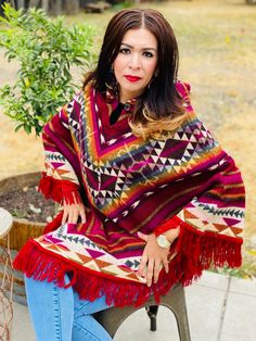 Short hooded ponchos in blend alpaca wool Bohemian Hooded Poncho For Fall, Bohemian Hooded Alpaca Poncho, Cozy Multicolor Hooded Poncho, Red Bohemian Hooded Poncho, Red Hooded Bohemian Poncho, Hooded Red Poncho For Fall, Red Hooded Poncho For Fall, Bohemian Hooded Shawl For Winter, Diy Feather