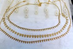 * Beautifully designed gold color belly chain. * can be used with belly dance costumes and saris. * Adjustable from 26 to 41 inches waist. Gold Bohemian Body Chain For Festivals, Bohemian Gold Body Chain For Festivals, Elegant Gold Chain Belt For Festival, Bohemian Gold Beads Waist Chain For Festivals, Bohemian Gold Waist Chain For Festivals, Bollywood Style Gold Festival Jewelry, Traditional Gold Bridal Belt With Tilla, Elegant Gold Waist Chain For Festive Occasions, Bollywood Tilla Waist Chain For Wedding