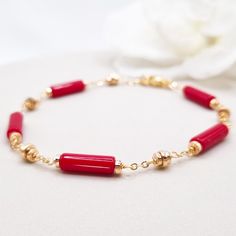 Beautiful handcrafted red coral bracelet with gold hematite brads. Made with high-quality gemstones, this statement bracelet radiates confidence and style, making it the perfect addition to any jewelry collection. With its bold red-gold hues and intricate design, this bracelet is sure to turn heads wherever you go. MATCHING RED CORAL EARRINGS: https://www.etsy.com/au/listing/1746209030/red-coral-earrings-for-women-handmade * Materials: 18k gold plated chain and clasp * Gemstone: Red coral stone Elegant Red Coral Beaded Bracelets With Round Beads, Elegant Red Coral Beaded Bracelets, Elegant Natural Stones Beaded Bracelet, Elegant Red Coral Beaded Bracelets For Gift, Elegant Red Coral Beaded Bracelet Gift, Elegant Red Bracelet For Gift, Gift Red Coral Bracelet With Gemstone Beads, Red Coral Bracelets As A Gift, Red Coral Bracelets For Gift