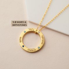 "This beautiful eternal circle necklace represents the bond between mom & children, grandma and her grandkids. It's a perfect gift for your loved one with up to 5 names. PRODUCT INFO * Material: Solid 925 Sterling Silver * Dimensions: Pendant measures ~7/8\" (23mm) in diameter * Word limits: 5 names/charm * By default, silver charm comes with BLACK engraving and gold-plated charm comes with CLEAR engraving * You can use birthstones for this necklace HOW TO ORDER * Select your preferred finis Adjustable Birthstone Name Necklace For Anniversary, Mother's Day Name Birthstone Necklace With Round Pendant, Mother's Day Birthstone Necklace With Name On Round Pendant, Adjustable Name Birthstone Necklace For Anniversary, Mother's Day Round Pendant Birthstone Necklace With Name, Personalized Mother's Day Birthstone Necklace Round Pendant, Mother's Day Birthstone Necklace With Name, Mother's Day Birthstone Name Necklace, Personalized Birthstone Necklace For Mother's Day