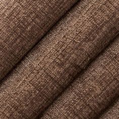 brown fabric textured with small squares and lines on the top, as well as dark brown