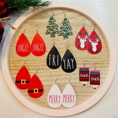 a wooden board with christmas decorations on it and the words friday written in different languages