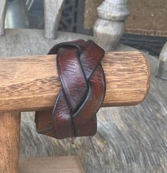 This braided leather cuff was made in the 70s....it was never used but is left over inventory from a  leather shop in Germany...I conditioned the leather but there is lots of patina on the snaps.... measurements are 9 inches long, 1 3/4 inches wide, from snap to snap this cuff measures 7 3/4 inches, so this cuff will fit a wrist up to 7 1/2 inches Biker Leather, Leather Cuffs Bracelet, Leather Shops, Leather Cuffs, Braided Leather, Vintage 70s, Cuff Bracelet, Leather Wallet, Hippie Boho