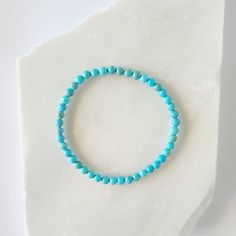 "Our turquoise howlite gemstone bracelet helps in dream recall and understanding of dreams. Turquoise Howlite is a calming stone, helps to calm and overactive mind. *This comes in four different sizes. Make sure to select the correct size from the drop down menu. 5.5\" 6\" 7\" 8\" Bead Size: 4mm **Make this into a diffuser bracelet. Add one of our sandalwood or bayong wood diffuser bracelets at checkout. Bayong wood: https://www.etsy.com/listing/963518379/4mm-natural-bayong-wood-diffuser?ref=sho Wood Diffuser, Dream Recall, Good Luck Bracelet, Meditation Bracelet, Rose Quartz Bracelet, Calming Stones, Diffuser Bracelets, Natural Stone Bracelets, Yoga Jewelry