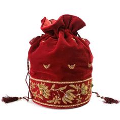 With a simple pull of the tasseled cords, you secure your prized possessions in this beautiful velvet embroidered bucket bag or potli bag embellished with genuine semi precious stones. A welcome feature is a removable chain shoulder strap for hands-free convenience. Perfect for Indian wedding or for fun around town! Expertly hand embroidered by third generation master zardozi artisans. Of exceptional quality. Our aim is the preservation of the zardozi embroidery art form, a centuries-old elabora Beaded Pouch Bag, Copper Flowers, Drawstring Bag Pattern, Beaded Pouch, Kawaii Bag, Zardozi Embroidery, Potli Bag, Pumpkin Patch Outfit, Free Crochet Bag