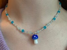 Blue mushroom necklace  LIMITED EDITION ⭐️💫 The necklace is made with glass beads and a strong elastic string. Blue Mushroom, Mushroom Necklace, Handmade Beaded Necklace, Handmade Beaded Necklaces, Copenhagen Denmark, Wedding Jewellery Necklace, Wedding Necklace, Copenhagen, Etsy App