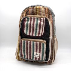 Hemp Cotton Mix Backpack, A Durable And Eco-Friendly Option For Carrying All Your Essentials. This Backpack Is Made From High-Quality Hemp And Heavy Duty Gheri Cotton Fabric, Known For Its Strength And Durability. Very Sturdy Bag,Also Features A Spacious Interior With Plenty Of Room For Your Books, And Other Daily Necessities. The Adjustable Straps Provide A Comfortable Fit, And The Reinforced Stitching Ensures The Backpack Can Withstand Heavy Use. This Hemp Backpack Is Also Environmentally Frie Eco-friendly Beige Backpack, Casual Brown Bag For Trips, Multicolor Daily Backpack With Zipper Pocket, Everyday Multicolor Backpack With Zipper Pocket, Daily Use Multicolor Backpack With Zipper Pocket, Eco-friendly Multicolor Travel Backpack, Casual Shoulder Bag For Trip, Eco-friendly Rectangular Travel Backpack, Multicolor Backpack With Zipper Pocket