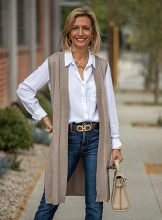 Here is our trendy Taupe Lightweight Open Front Cardigan Vest  Knitted in a soft lightweight taupe yarn Yarn content: 70% Viscose, 30% Nylon Color: Taupe Straight long body with two side slits Two pockets in the front Ribbing detail in the front, armholes and pocket  Center back length 34" Wardrobe For 60 Year Old, Ageless Style Over 70 Classy, Chic Taupe Cardigan For Fall, Beige Cardigan For Business Casual In Fall, Fall Business Casual Beige Cardigan, Chic Neutral Cardigan For Work, Chic Taupe Cardigan For Spring, Chic Beige Cardigan For Layering, Chic Taupe Spring Cardigan