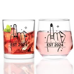 two glasses filled with different types of drinks and one has a finger print on the side