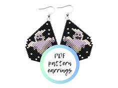 a pair of black and white beaded earrings with the words poe pattern earrings on it